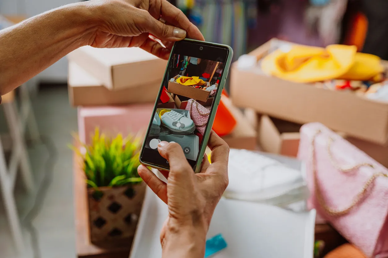 Senior woman selling clothes and accessories online