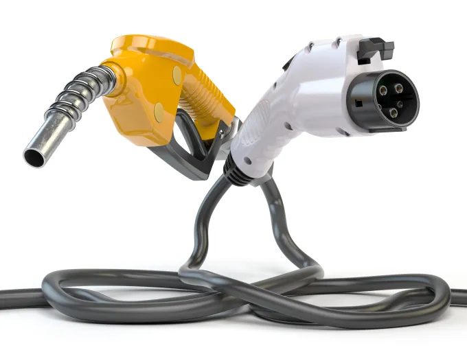 Electric vehicle EV charging plug and gas nozzle isolated on white. 3d illustration