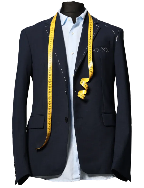 Semi-ready jacket, shirt and measuring tape on mannequin